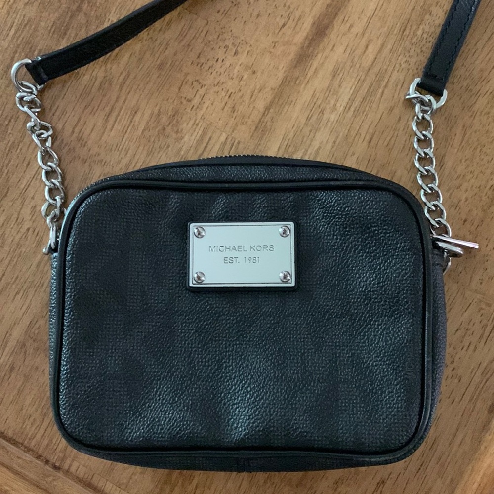 SOLD!!Small Michael Kors Cross body bag. Looks new!
